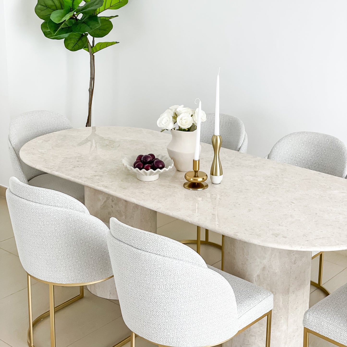 Luxury Oval 6 seater table made of Omani marble in Oman. Picture perfect marble furniture for upscaling any dining room.