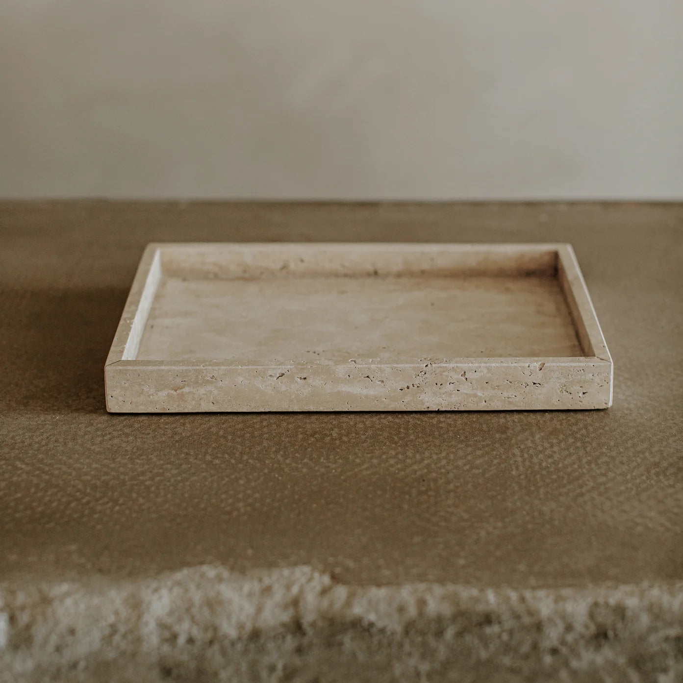 Beige luxury furniture piece. The Travertine Marble Tray