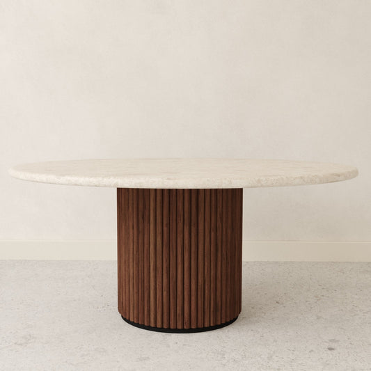 A round marble dining table top and a brown wooden cylindrical pillar base