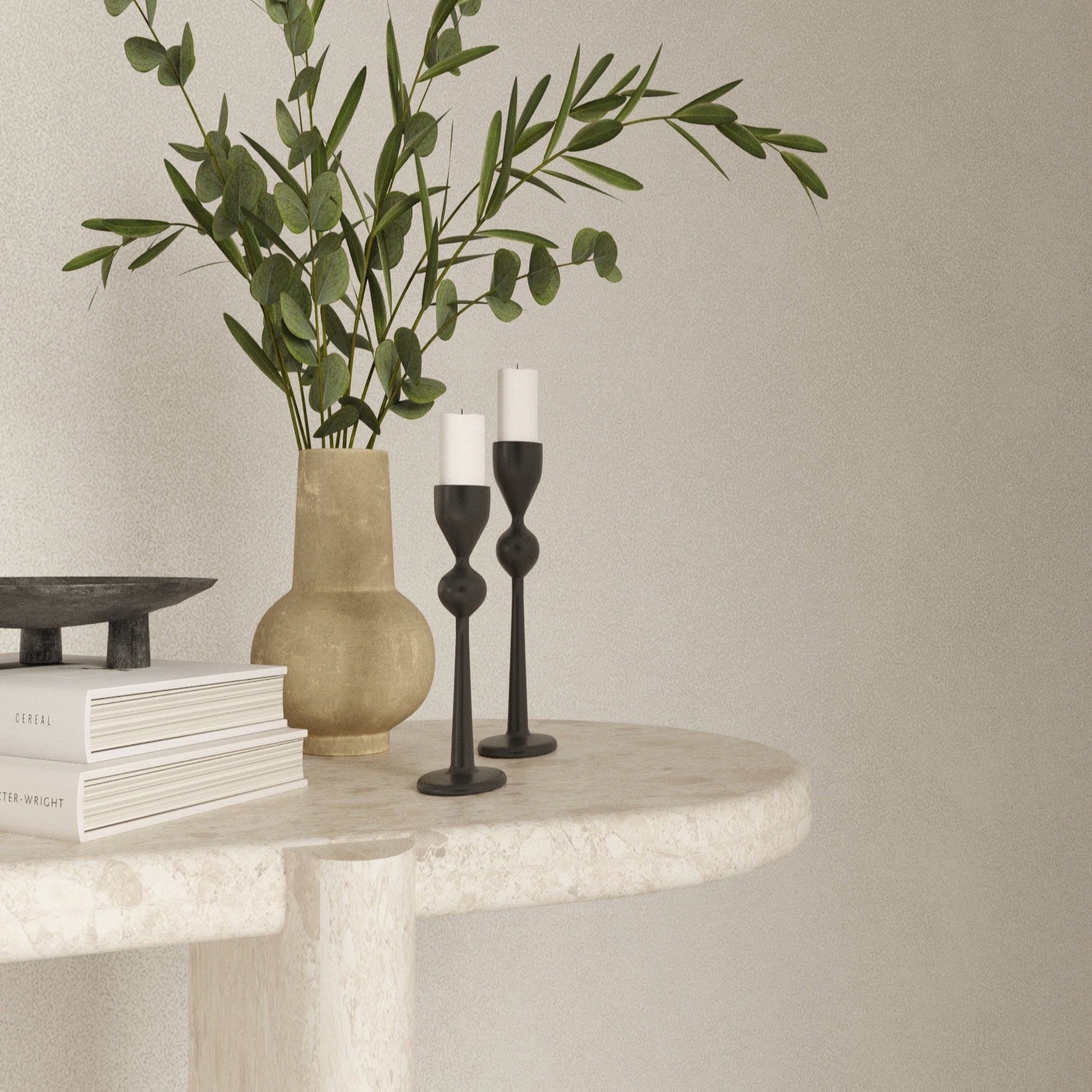 Close up of the Serenity Collection Omani Marble Table with smooth curve on the table as well as the table support.